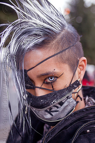 guy in punk fashion - white contact lens - zippered face mask (san francisco), color contact lenses, darik, dereck, derrick demolition, ear piercing, eye liner, eye patch, eyebrow piercing, fashion, make-up, man, mohawk hair, mouth mask, punk, special effects contact lenses, theatrical contact lenses, white contact lenses, white contacts, white mohawk, zippers