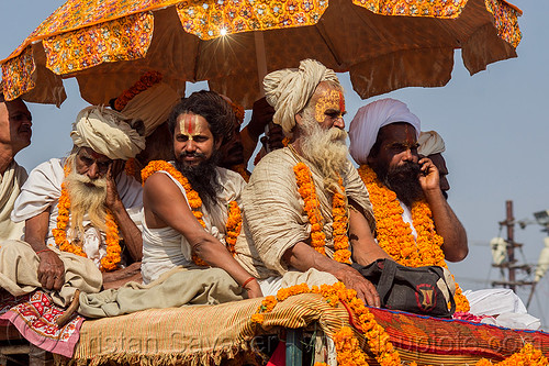 hindu gurus and babas on their float - kumbh mela (india), float, gurus, hindu pilgrimage, hinduism, kumbh maha snan, kumbh mela, mauni amavasya, men, parade, umbrella