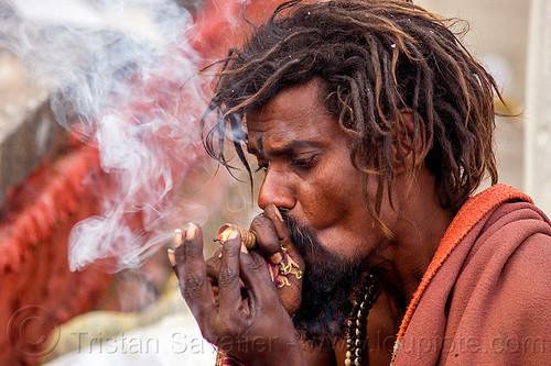 hindu man smoking weed - ritual cannabis (nepal), baba smoking chillum, chillum pipe, dreadlocks, ganja, hindu, hinduism, kathmandu, maha shivaratri, man, pashupatinath, sadhu, smoke, smoking pipe, smoking weed