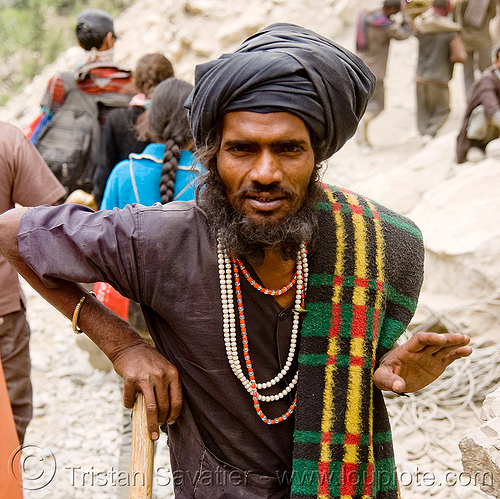 hindu pilgrim resting - amarnath yatra (pilgrimage) - kashmir, amarnath yatra, beard, headwear, hindu man, hindu pilgrimage, hinduism, kashmir, mountain trail, mountains, necklaces, pilgrim, turban, walking stick
