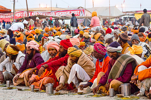 hindu pilgrims eating holy prasad - kumbh mela 2013 (india), ashram, crowd, dinner, eating, food, hindu pilgrimage, hinduism, holy prasad, kumbh mela, men, pilgrims, rows, sitting