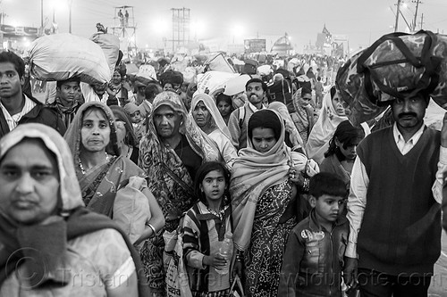 hindu pilgrims exodus - kumbh mela (india), bags, bundles, carrying on the head, crowd, exodus, hindu pilgrimage, hinduism, kumbh mela, luggage, men, night, walking, women