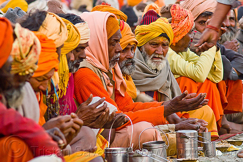 hindu pilgrims receiving holy prasad - kumbh mela 2013 (india), ashram, bhagwa, crowd, dinner, eating, food, hindu pilgrimage, hinduism, holy prasad, kumbh mela, men, pilgrims, rows, saffron color, sitting