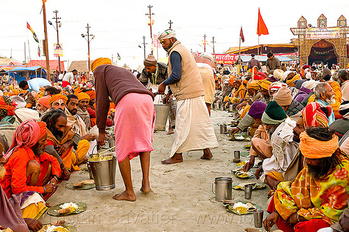 hindu pilgrims receiving holy prasad - kumbh mela 2013 (india), ashram, buckets, crowd, dinner, eating, food, hindu pilgrimage, hinduism, holy prasad, kumbh mela, men, pilgrims, rows, serving, sitting
