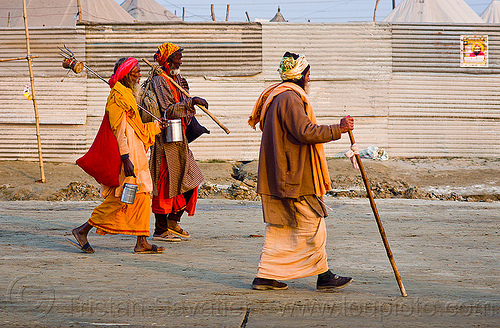 hindu pilgrims walking - kumbh mela 2013 (india), baba, bhagwa, cane, food boxes, hindu holy man, hindu pilgrimage, hinduism, kumbh mela, men, pilgrims, sadhu, saffron color, sticks, walking stick