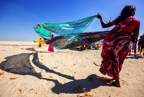 hindu women drying saris in the wind after holy dip - varanasi (india), beach, drying, indian woman, river bank, sand, saree, sari, varanasi, wind