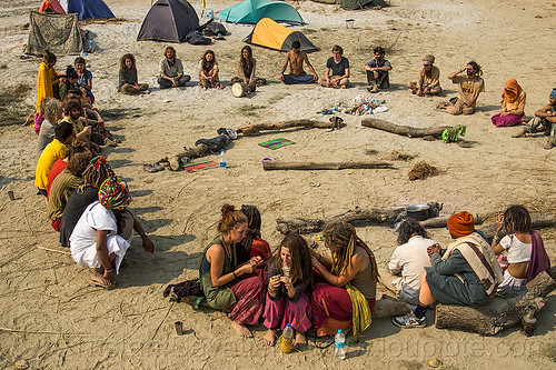 hippies sitting in supper circle at rainbow camp - kumbh mela 2013, camp fire, camping, circle, crowd, hindu pilgrimage, hinduism, hippie, kumbh mela, rainbow camp, sitting, tents