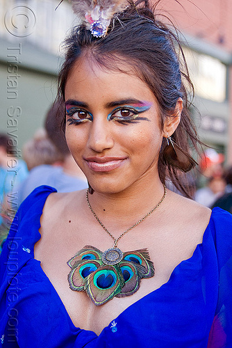 indian woman with peacock feather necklace, eye makeup, gay pride festival, peacock feather necklace, peacock feathers, woman