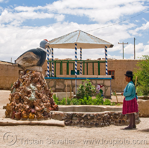 indigenous woman and bird monument (bolivia), alota, bolivia, bowler hat, indigenous, monument, quechua, village, woman