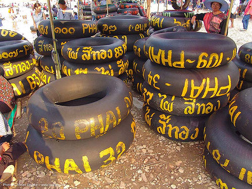 inner tubes with yellow paint markings - river tubing - thailand, fair, fang, inner tubes, river tubing, songkran, tha ton, สงกรานต์