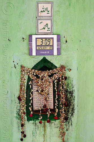 islamic shrine with lcd clock, altar, arabic, british residency, digital clock, flower strings, flowers, green wall, imambara, islam, lcd clock, lucknow, mosque, nawabi mahal, nawabi masjid, tiles, time, urdu script, urdu writing, wall clock