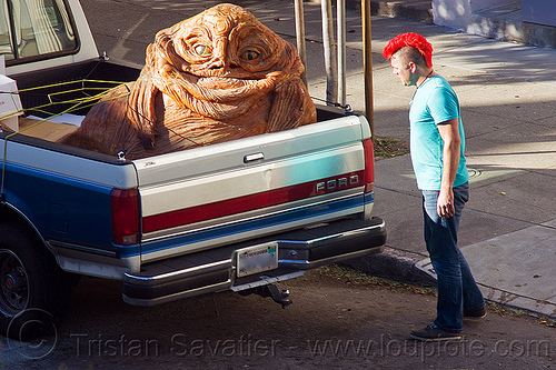 jabba the hutt in a pickup truck, character, giant muppet, jabba the hutt, man, mohawk hair, pickup truck, punk, special effects, starwars