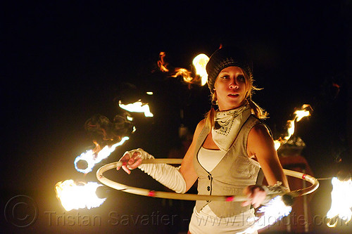 joanna with fire hula hoop, fire dancer, fire dancing, fire hoop, fire performer, fire spinning, hula hooper, hula hooping, hulahoop, joanna, night, white bandana, white bandanna, woman