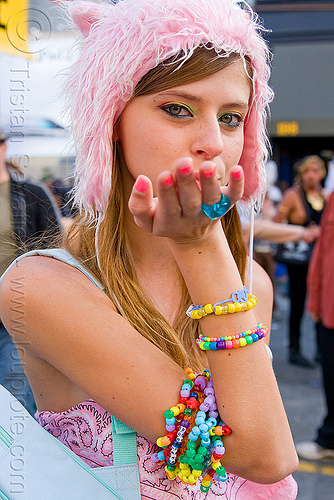 kandi girl blowing a kiss, beads, blowing a kiss, bracelets, brianna, kandi kid, kandi raver, pink fuzzy hat, rave fashion, woman