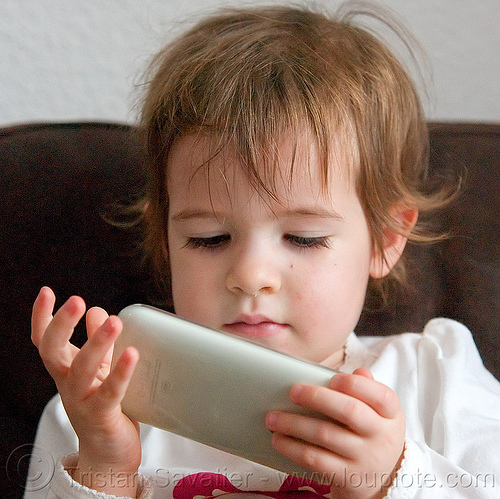 kid playing a video game on an iphone, cellphone, child, iphone, kid, little girl, playing, video game
