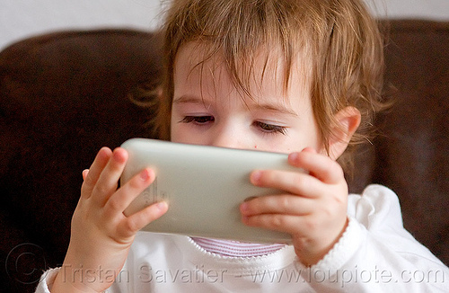 kid playing video game on iphone, cellphone, child, iphone, kid, little girl, playing, video game