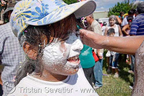 kid with face covered with party foam - carnaval - carnival in jujuy capital (argentina), andean carnival, argentina, cap, carnaval de la quebrada, child, jujuy capital, kid, noroeste argentino, party foam, san salvador de jujuy
