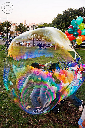 kids trapped in giant soap bubble, balloons, big bubble, children, giant bubble, iridescent, kids, lawn, park, playing, soap bubbles