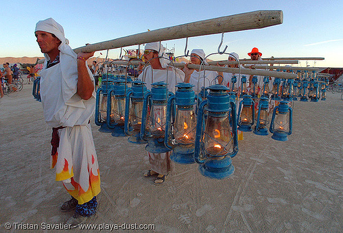 lamplighters - burning man 2005, lamplighters, march, petrol lanterns, poles