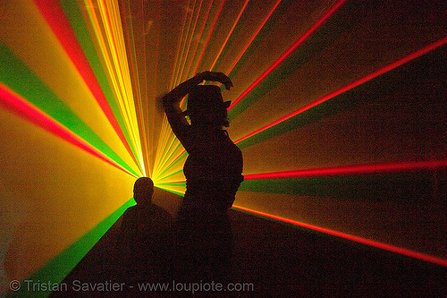 laser show - girl with hat - shadows in warehouse underground rave party, backlight, laser lightshow, laser show, lasers, nightclub, nightlife, rave lights, ravers, silhouettes