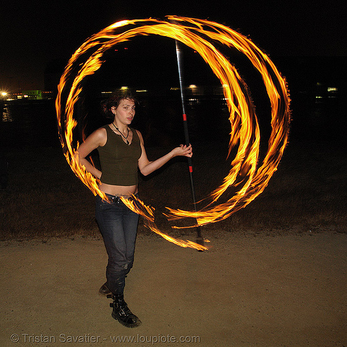 lexie spinning a fire staff, fire dancer, fire dancing, fire performer, fire spinning, fire staff, lexie, night, spinning fire