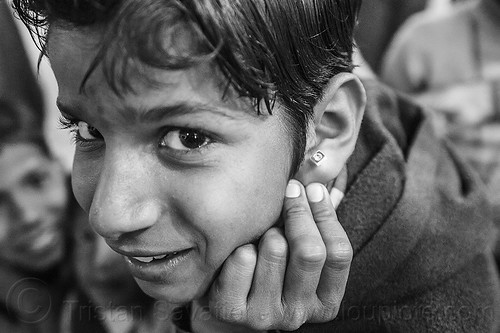 little boy proudly showing his earring, boy, child, ear piercing, earring, hindu pilgrimage, hinduism, kid, kumbh mela, night, pilgrim, proud, showing