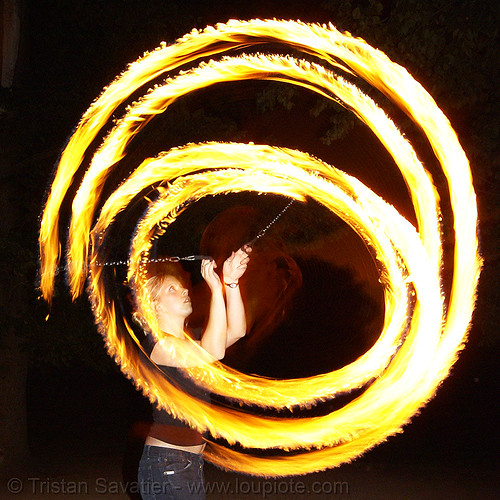 louise spinning fire poi, circle, double poi, fire dancer, fire dancing, fire performer, fire poi, fire spinning, night, ring, spinning fire
