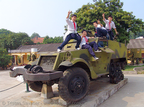 m3 half-track armored vehicle - war - vietnam, armored, army museum, children, hanoi, kids, m3 half-track, m5 half-track, military, peace sign, v-sign, victory sign, vietnam war