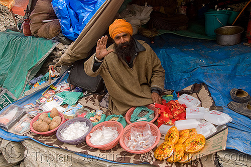 man and his shop - amarnath yatra (pilgrimage) - kashmir, amarnath yatra, headwear, hindu man, hindu pilgrimage, kashmir, pilgrim, shop, tent