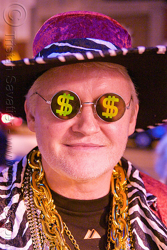 man in pimp costume - halloween (san francisco), chains necklace, costume, dollar signs, halloween, hat, hologram sunglasses, holograms, man, pimp
