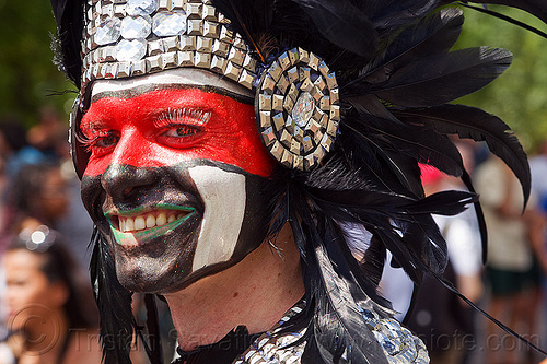 man with aztec dancer headdress, aztec dancer, black feathers, costume, facepaint, gay pride, headdress, man, red