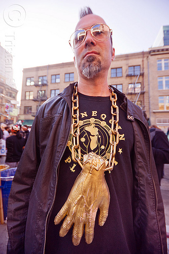 man with golden hand necklace - how weird 2012, golden chain, golden hand, man, necklace