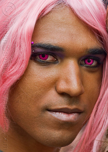 man with pink contacts lenses, color contact lenses, eyebrow piercing, gay pride, man, pink contact lenses, pink contacts, special effects contact lenses, theatrical contact lenses