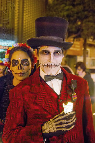 man with skull makeup and red costume - michael paim, bowtie, candle, day of the dead, dia de los muertos, face painting, facepaint, halloween, hands, hat, man, michael paim, night, red color, sugar skull makeup, woman