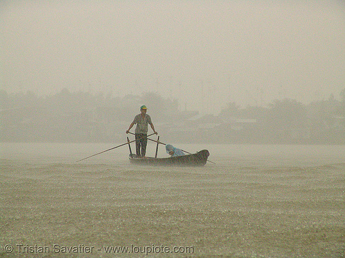 mekong river - monsoon rain - row boat - vietnam, heavy rain, mekong river, monsoon rain, pouring rain, river boat, rowing boat, small boat, standing rowing