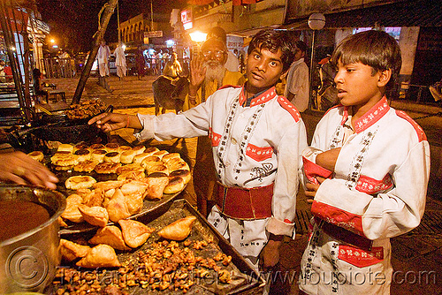 members of marching band buying samosas - orchha (india), boys, marching band, night, orchha, samosas, stall