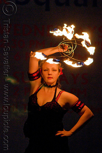 memory with fire fans - fire performer - temple of poi 2009 fire dancing expo - union square (san francisco), fire dancer, fire dancing expo, fire fans, fire performer, fire spinning, lena, memory, night, pyrotation, spinning fire, temple of poi, woman