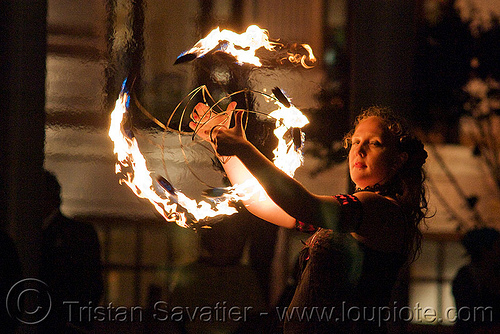 memory with fire fans - fire performer - temple of poi 2009 fire dancing expo - union square (san francisco), fire dancer, fire dancing expo, fire fans, fire performer, fire spinning, lena, memory, night, pyrotation, spinning fire, temple of poi, woman