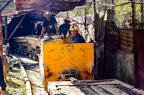 mine trolley with ore - balatoc mines (philippines), balatoc mines, gold mine, head light, mancart, men, mine railway, mine train, mine trolley, mine worker, miner, safety helmet, workers