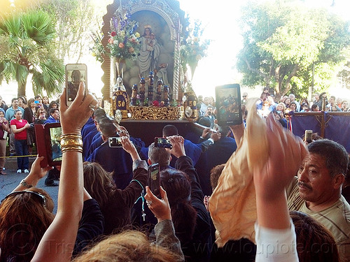 mobile photo sharing at catholic procession, crowd, float, lord of miracles, parade, paso de cristo, peruvians, sacred art, señor de los milagros