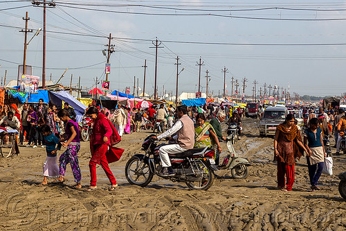 muddy market street (india), botorcycle, hindu pilgrimage, hinduism, kumbh mela, mud ruts, muddy road, muddy street, traffic, underbone motorcycle, walking