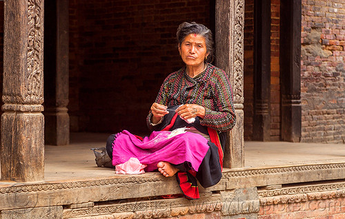 nepali hindu woman sitting in a pati (nepal), bhaktapur, pati, pillars, sitting, woman, wood carving, wooden
