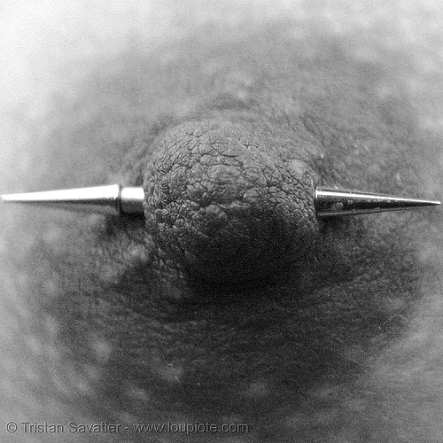 nipple piercing with spike barbell, body jewelry, closeup, nipple piercing, spike barbell, spiky barbell