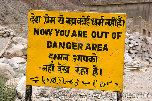 now you are out of danger area - sign - leh to srinagar road - kashmir, arabic, bro road signs, danger area, hazard, hindi, kashmir, road sign, urdu script, urdu writing