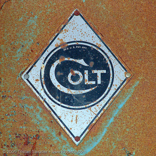 old colt logo in abandoned factory (san francisco), circle, colt defense, diamond, hunter's point, logo, lozenge, plate, rhombus, rusty
