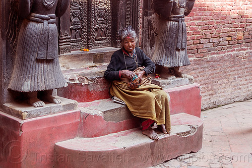 old nepali hindu woman on temple steps - bhaktapur durbar square (nepal), bhaktapur, durbar square, hindu, hinduism, old woman, sitting, steps, tilak, tilaka