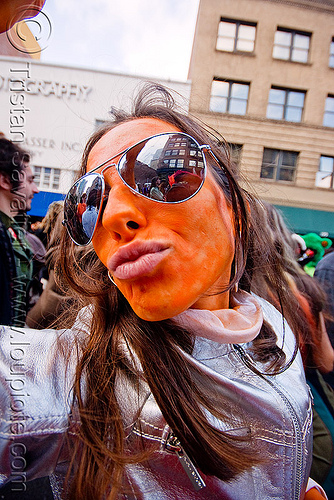 orange face paint - rayban sunglasses - silver color jacket, face painting, facepaint, mirror sunglasses, orange, silver color, woman