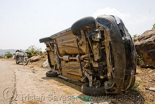 overturned car on its side, car accident, car crash, kashmir, overturned car, road, rollover, tata indica, tata motors, traffic accident, underbelly, white, wreck