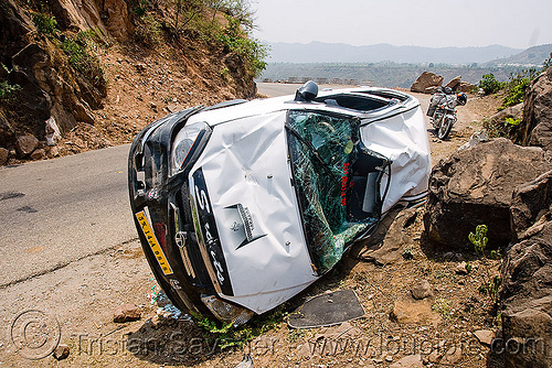 overturned car - traffic accident - indica dle, car accident, car crash, kashmir, overturned car, road, rollover, tata indica, tata motors, traffic accident, white, wreck
