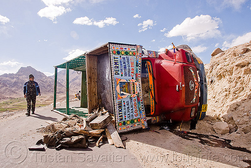 overturned truck - khardungla pass - ladakh (india), crash, khardung la pass, ladakh, lorry accident, man, mountain pass, overturned truck, road, rollover, tata motors, traffic accident, truck accident, wreck